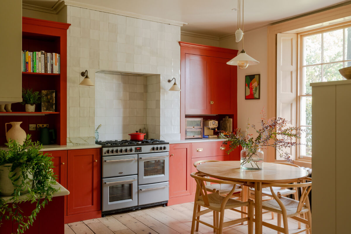 Best of 2025: Kitchens 81 red kitchen with zellige tiles and round dining table