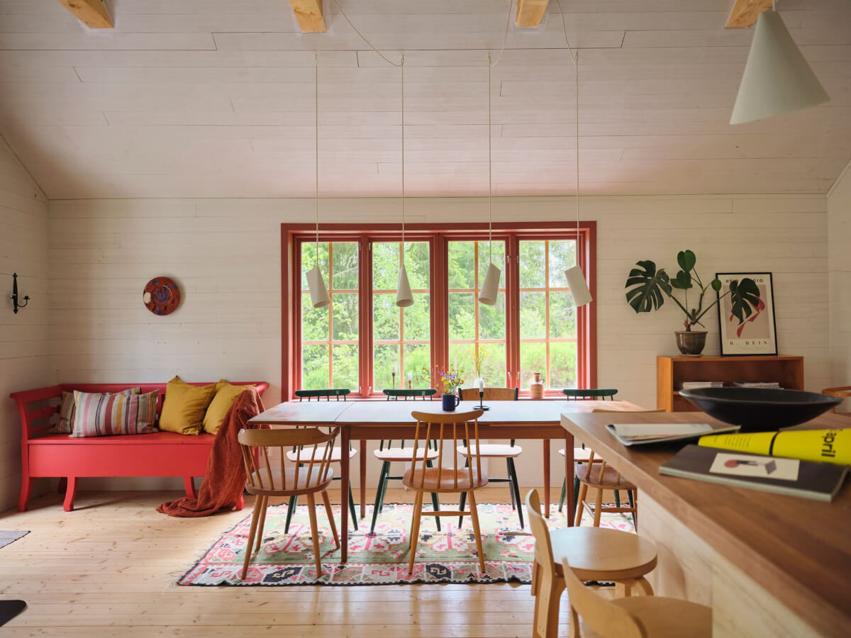 A Charming, Extended 19th-Century Log House in Sweden 9 red window frames living space