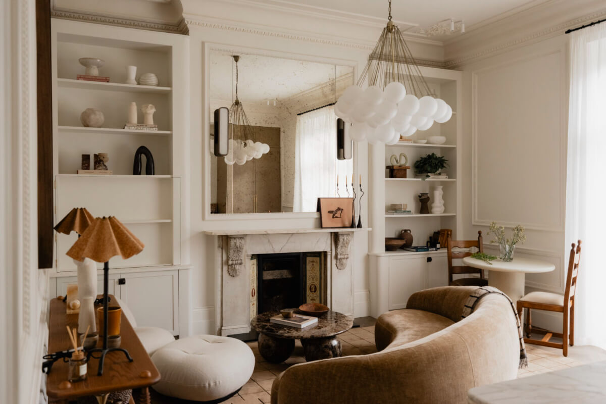 Best of 2025: Living Rooms 39 sitting room marble fireplace bookshelves curved sofa