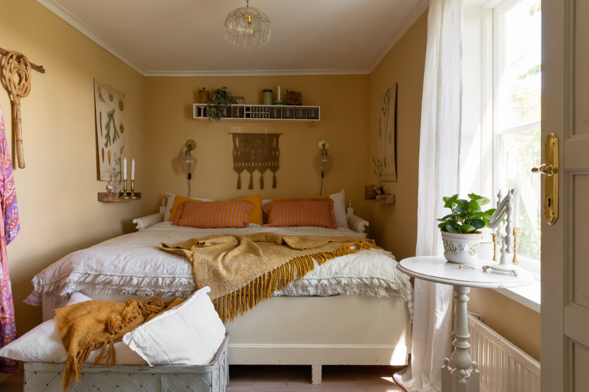 An Idyllic 18th Century Cottage with a Charming Garden 23 small golden yellow bedroom