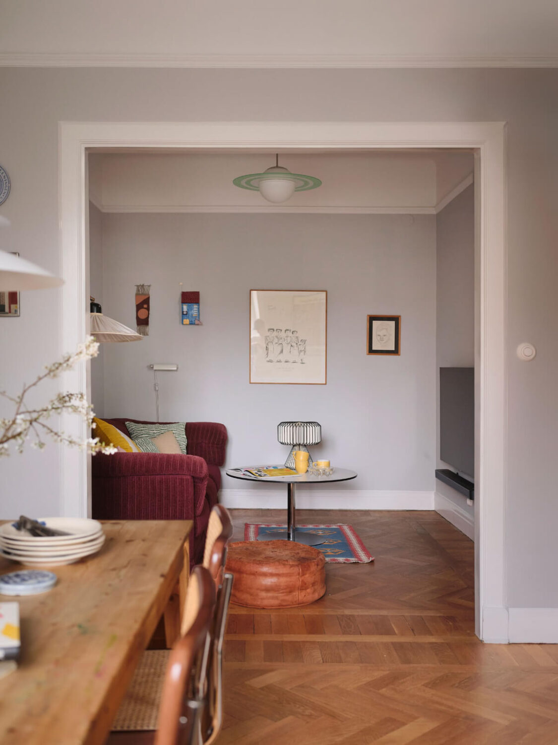 An Early 20th Century Apartment with a Muted Green Kitchen 8 small sitting room