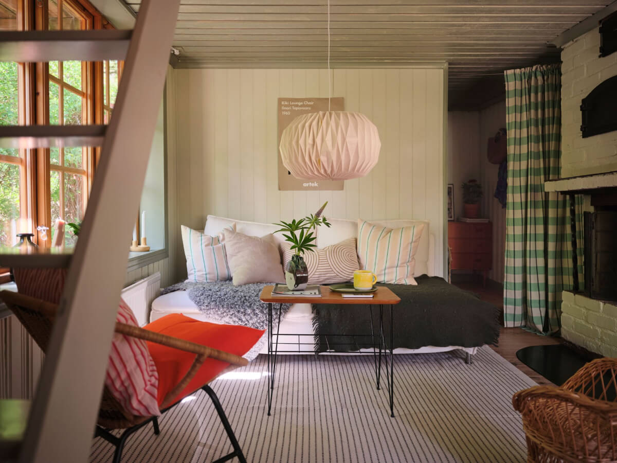 A Charming, Extended 19th-Century Log House in Sweden 18 small sitting room brick fireplace