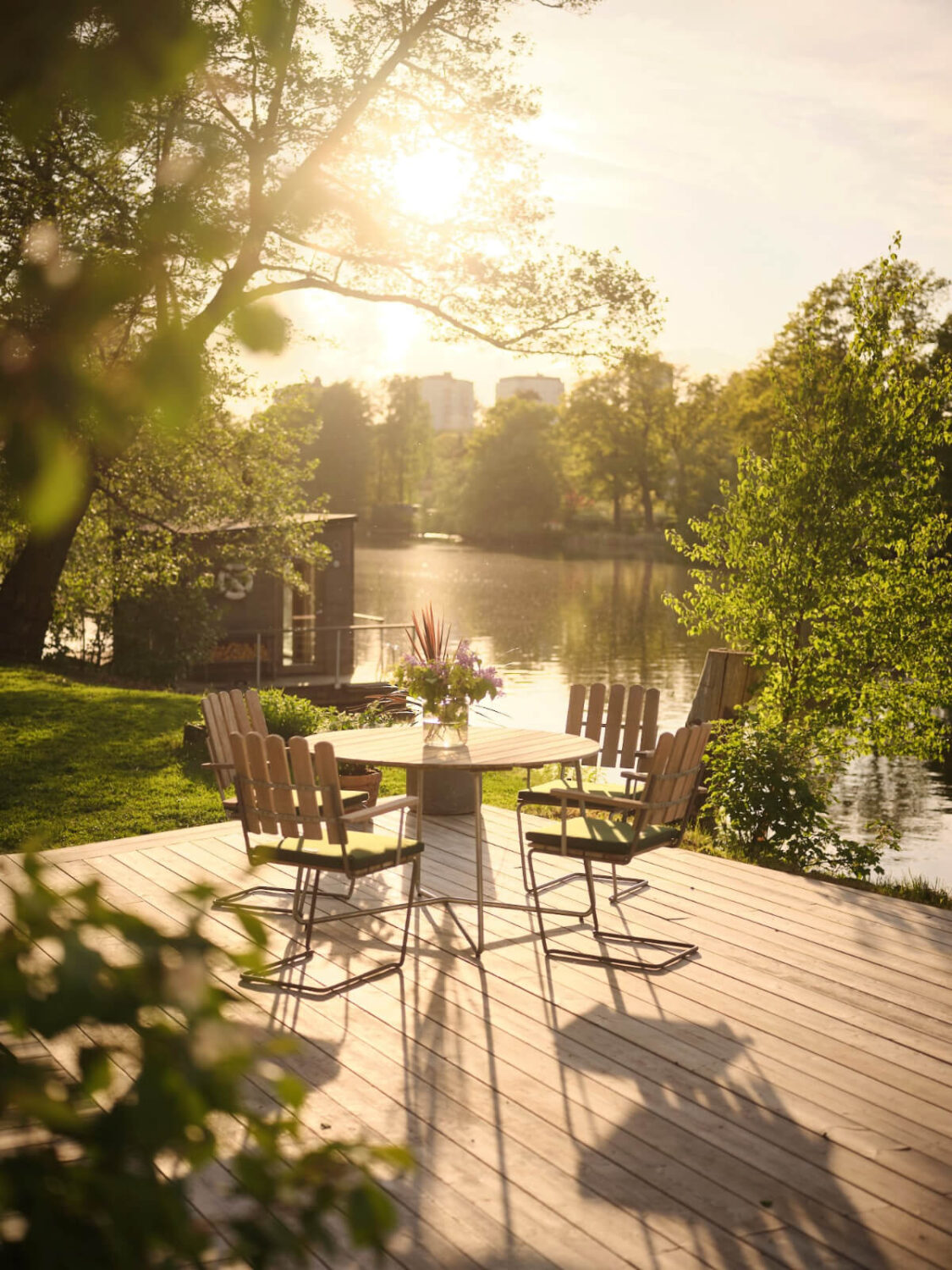 This Extended 19th Century Lakeside House is a Green Oasis in the City 2 sunlight lakeside terrace