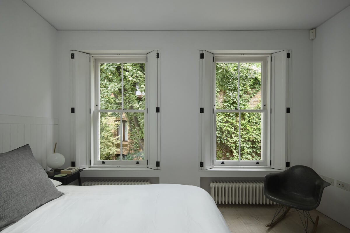 A Black and White Primrose Hill Mews House with a Roof Terrace 10 white bedroom window shutters