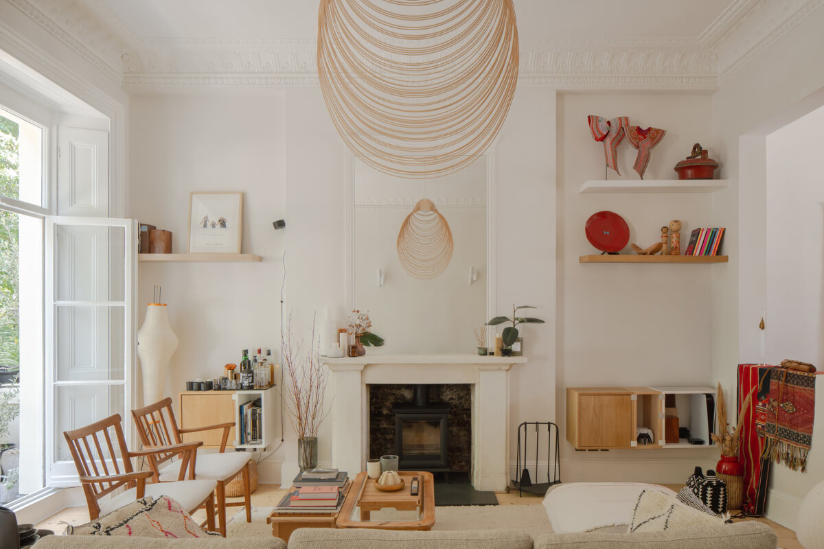 Historic Charm and Modern Design in a Light-Filled Pimlico Apartment 2 white living room centered around fireplace large windows