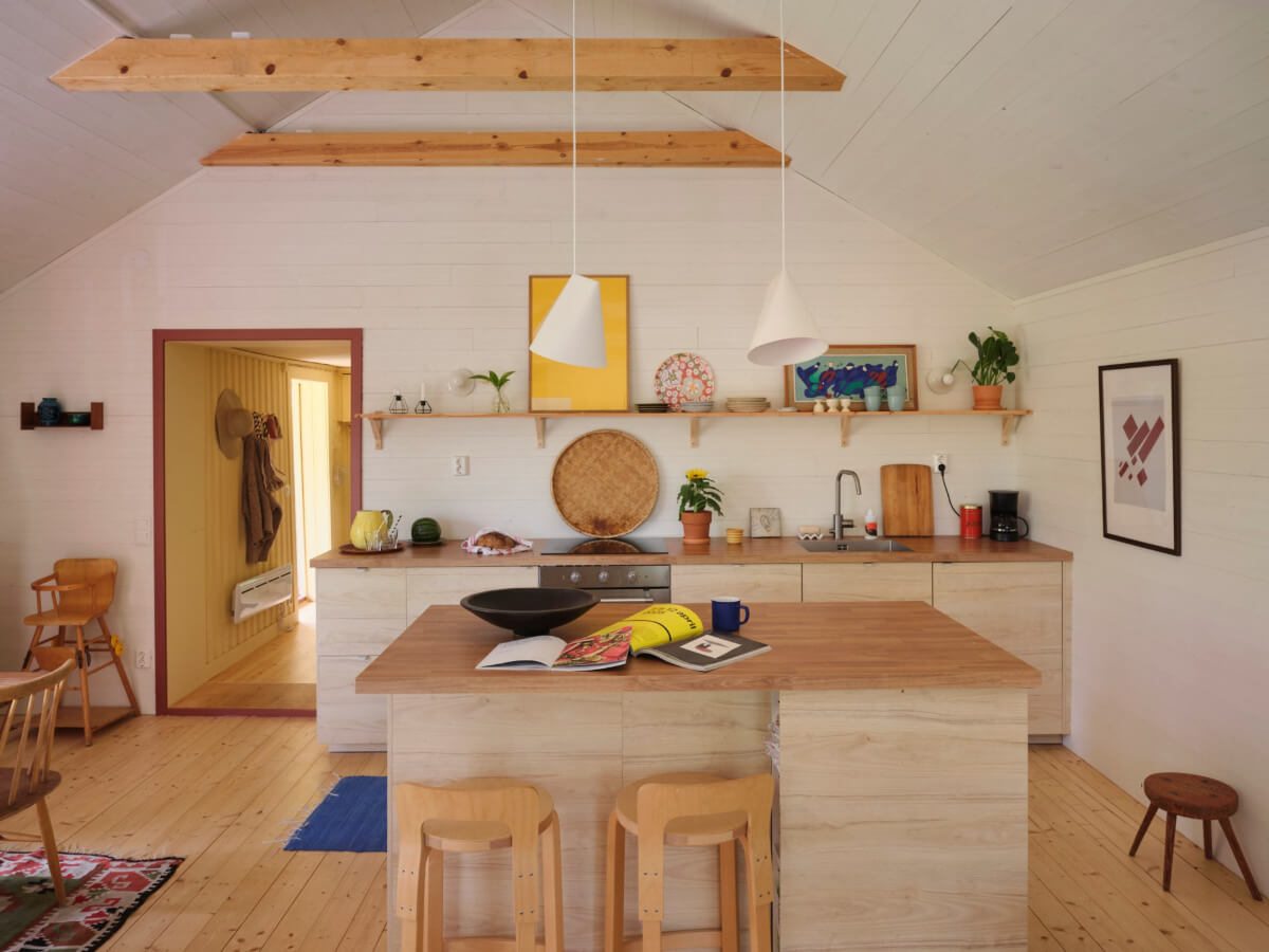 A Charming, Extended 19th-Century Log House in Sweden 12 wood kitchen with island