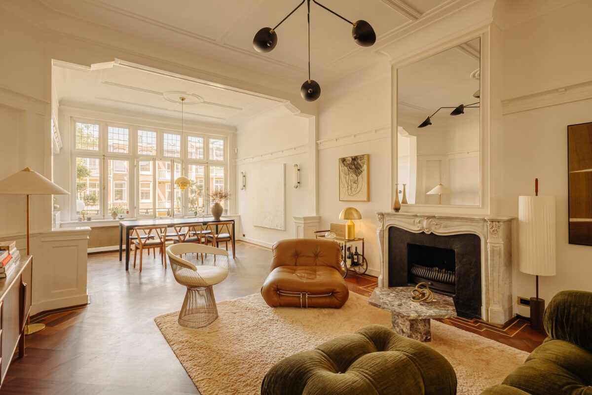 A Luxurious Parisian-Inspired Apartment in Amsterdam 2 amsterdam living room marble fireplace