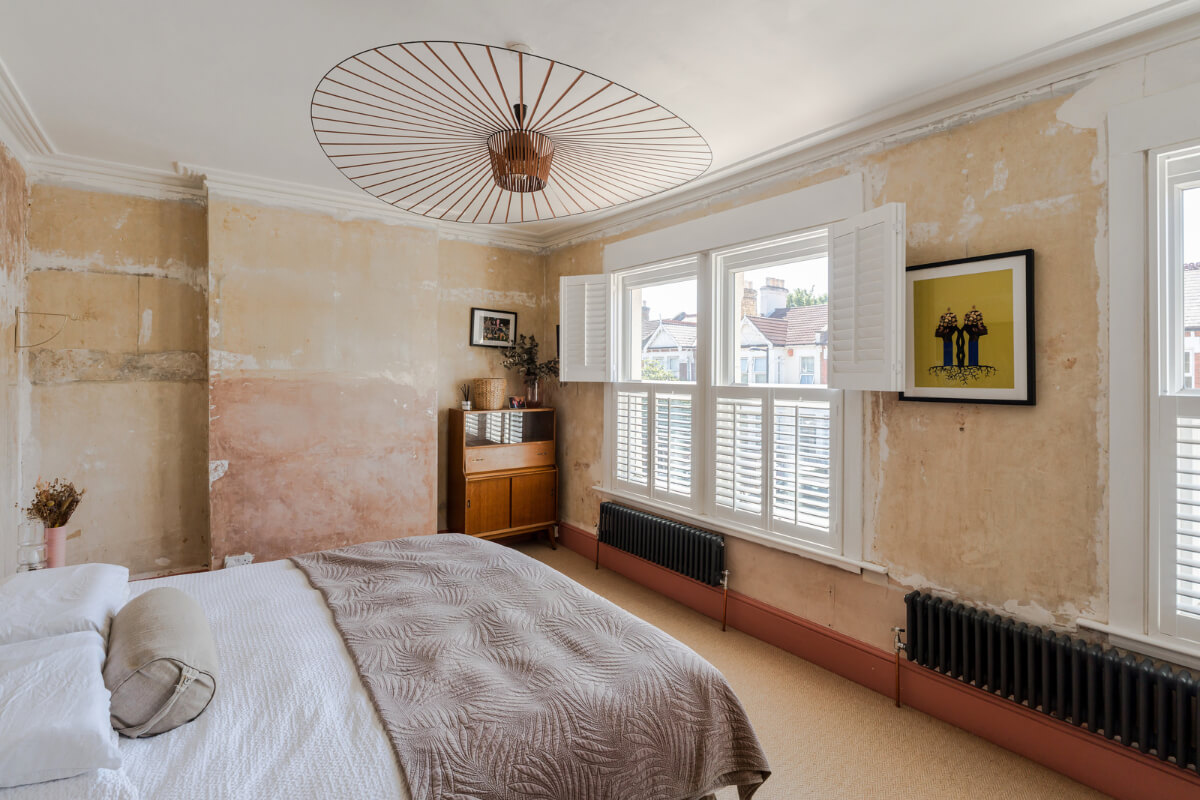 A Two-Tone Pink Living Room in a Victorian London House 13 bedroom large windows raw walls