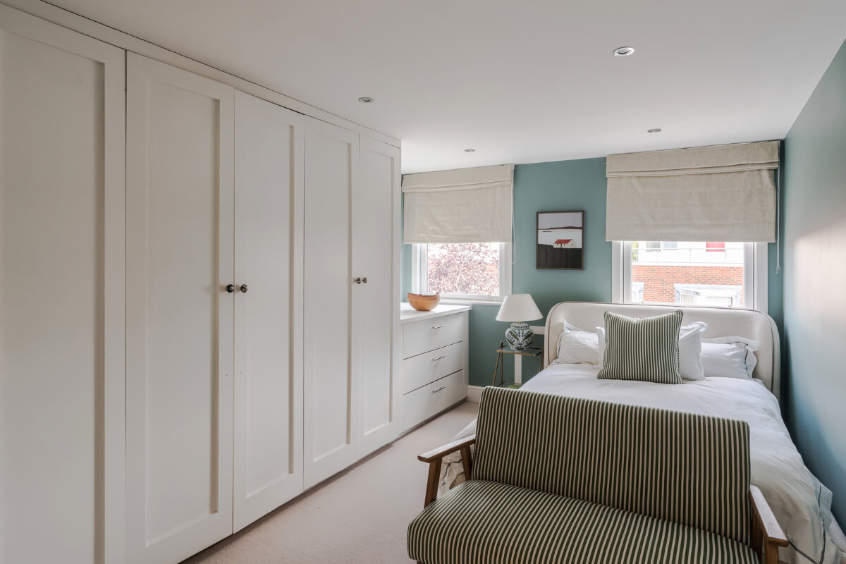 Color, Pattern, and Texture in a Renovated London Townhouse 21 blue bedroom striped sofa