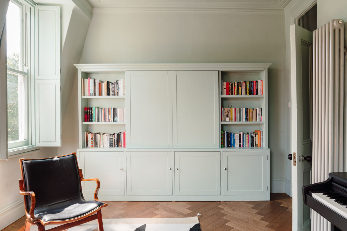 Pastel Tones and Deep Yellow in an Early 20th-Century London Apartment 6 cabinets bookshelves