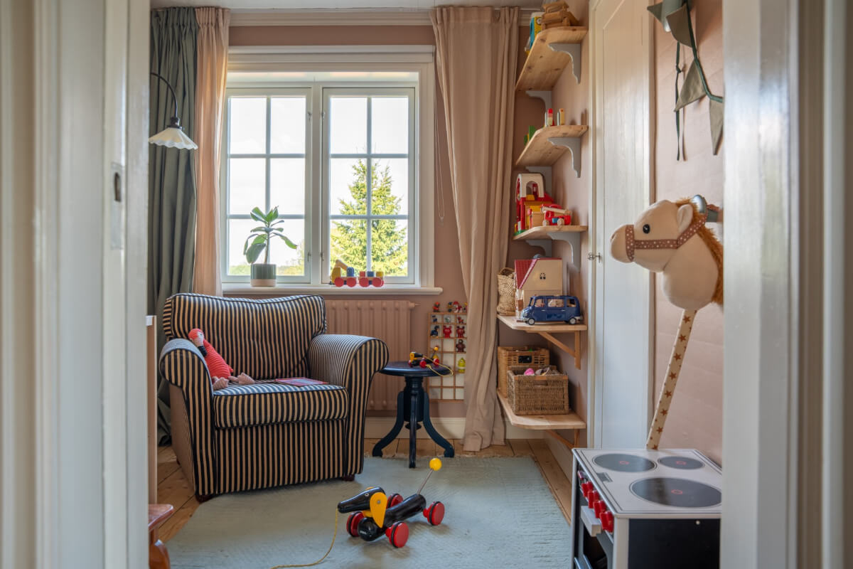 A Charming Historic Country House North of Stockholm 36 childrens room striped chair