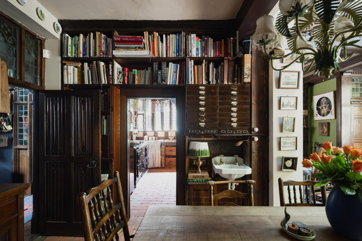 Medieval Craftsmanship & Georgian Elegance in an English Townhouse 4 dining room historic home bookshelves around doorframe