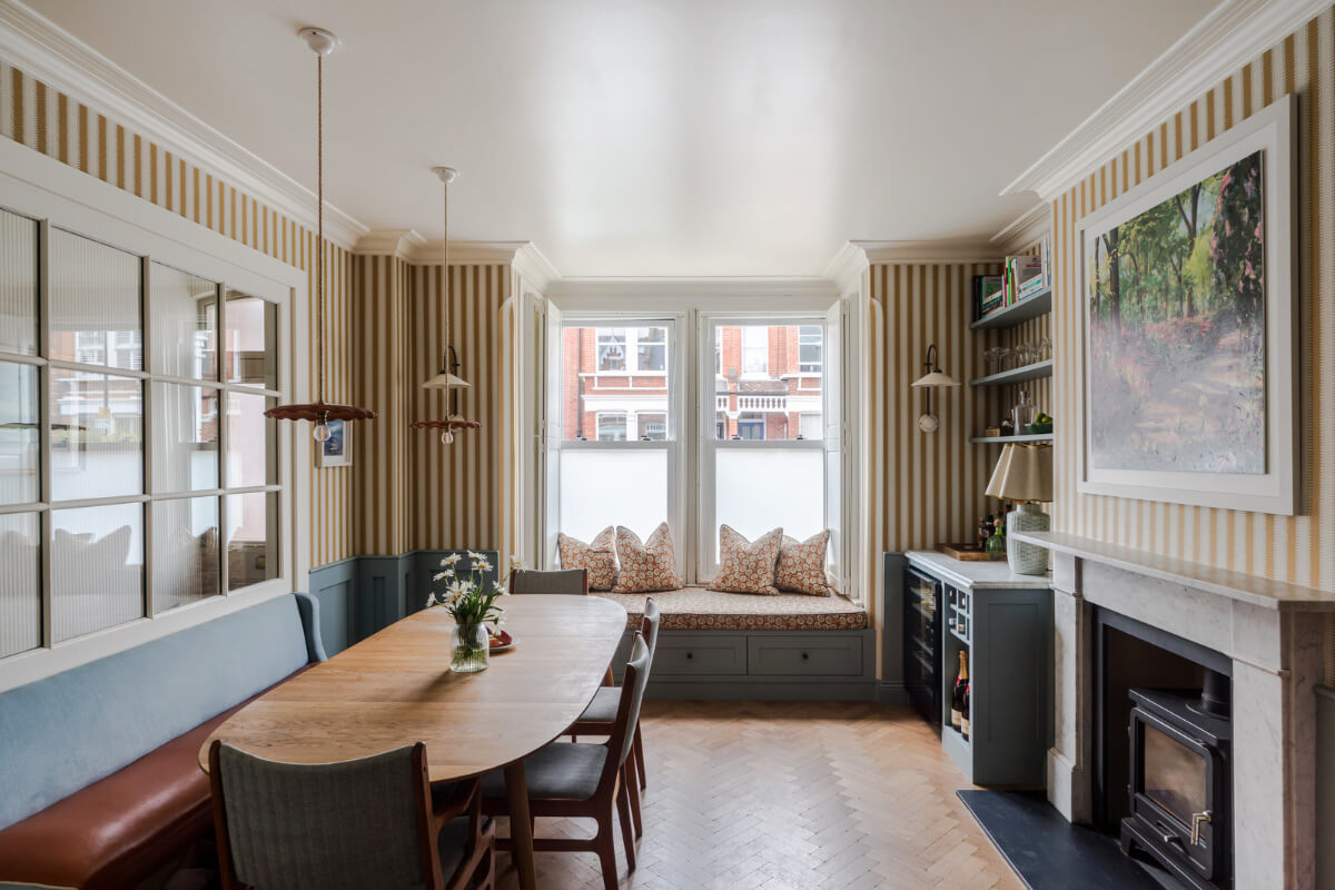 Best of 2025: Dining Rooms 8 dining room striped wallpaper window seat fireplace