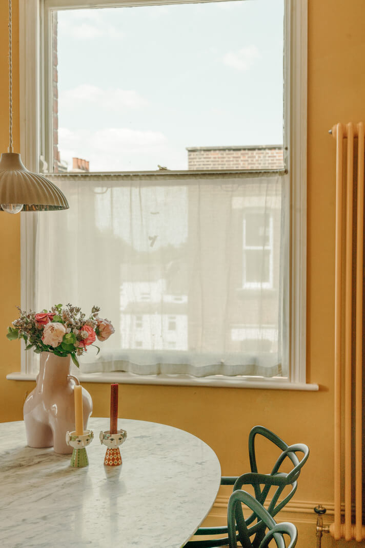 Pastel Tones and Deep Yellow in an Early 20th-Century London Apartment 12 dining table detail