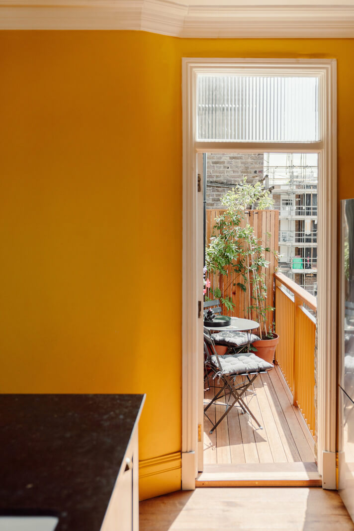 Pastel Tones and Deep Yellow in an Early 20th-Century London Apartment 15 door to balcony