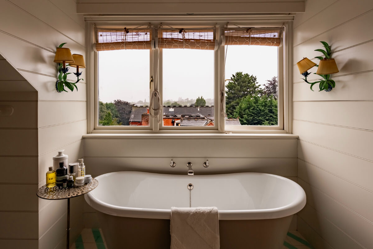 A Colorful Eclectic Victorian Maisonette Home in England 19 freestanding bath