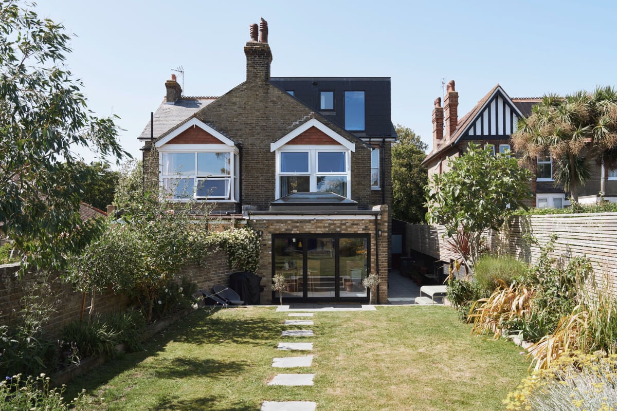 Colorful Rooms and a Modern Kitchen in a Spacious Family Home 27 garden exterior london house Colorful Rooms and a Modern Kitchen in a Spacious Family Home
