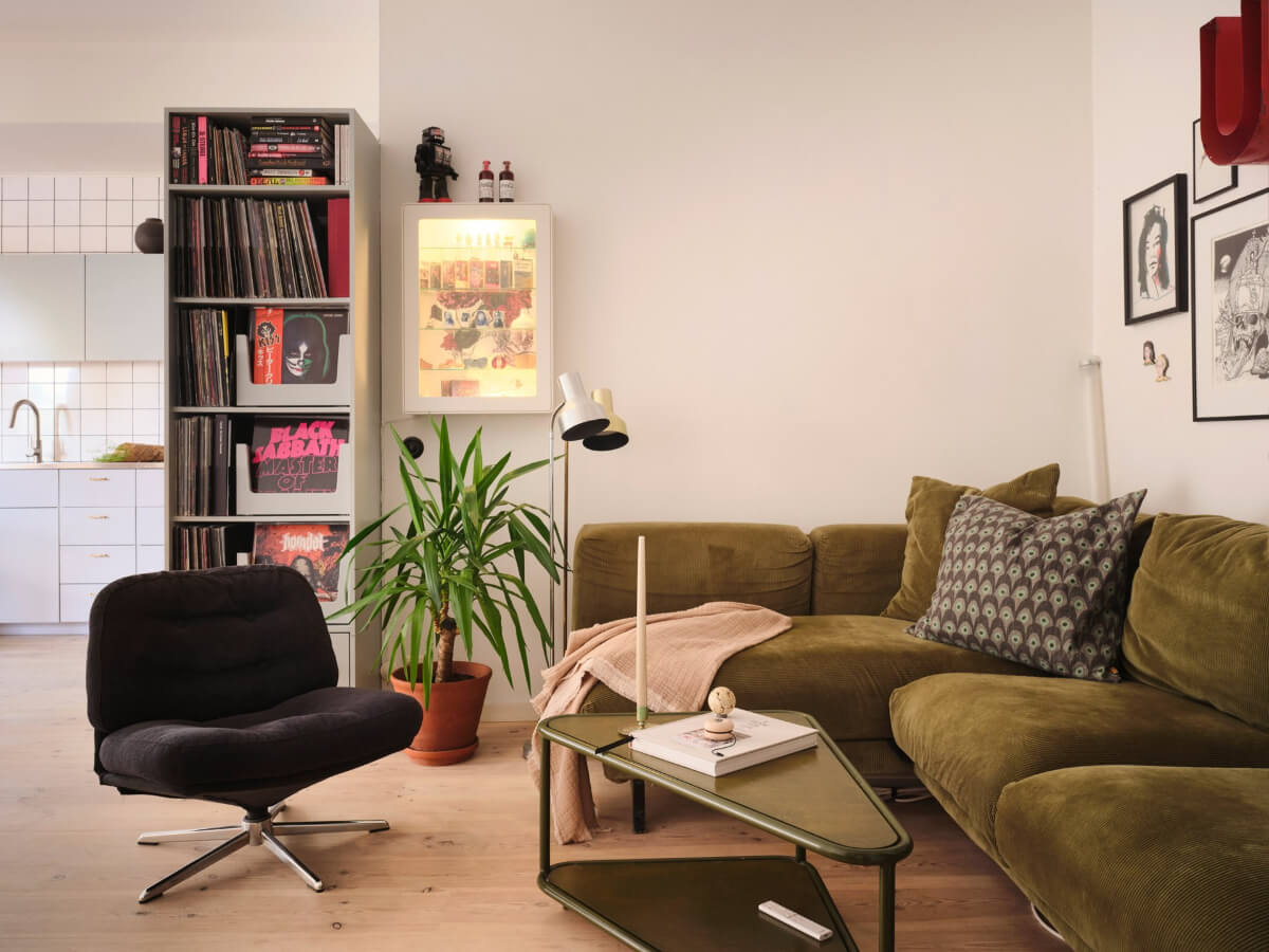 A Bright Family Apartment in a 1950s School Building 3 green sofa open-plan living space scandi home