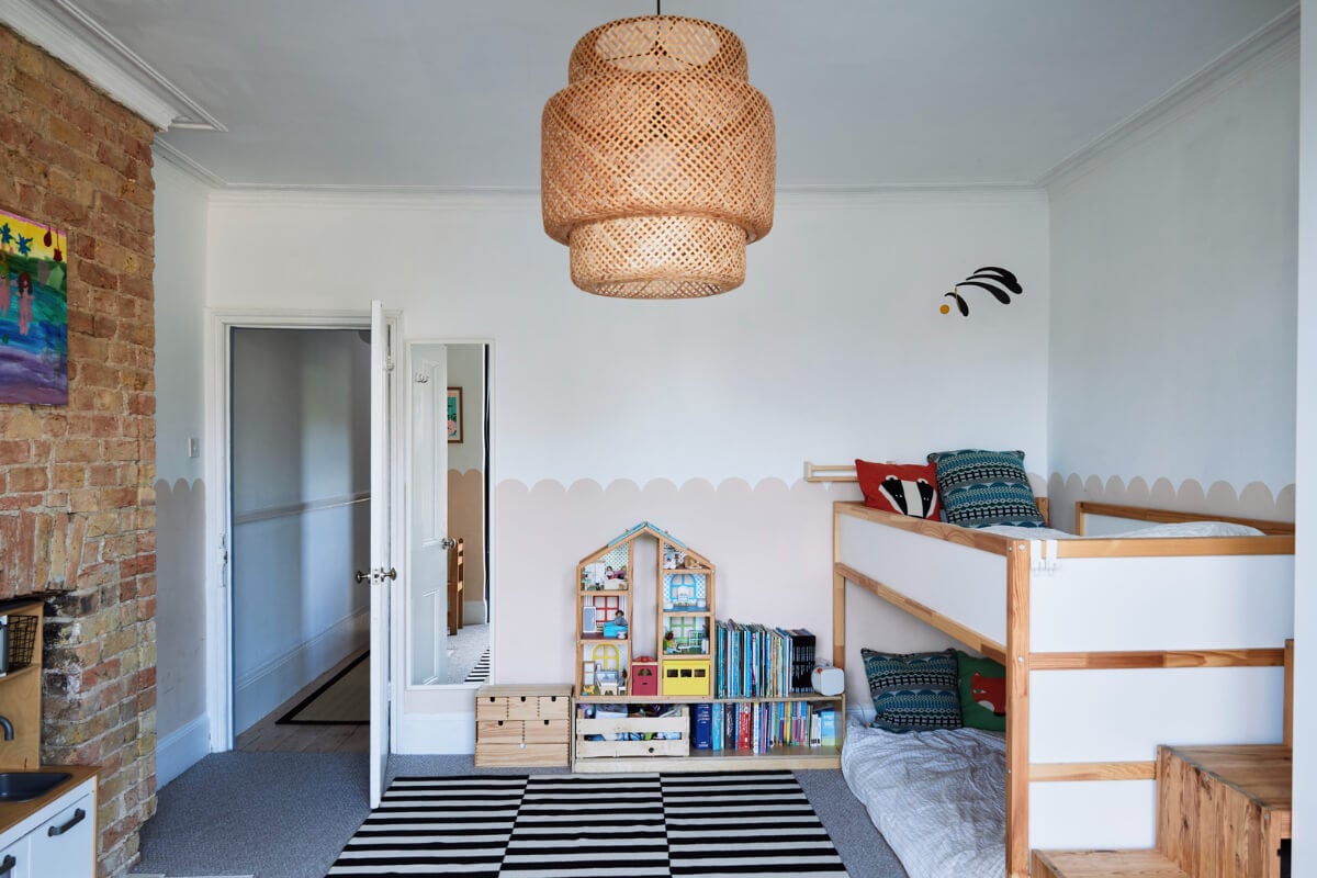 Colorful Rooms and a Modern Kitchen in a Spacious Family Home 18 kids bedroom exposed brick soft pink wall detail