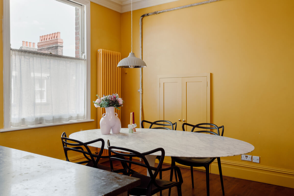 Pastel Tones and Deep Yellow in an Early 20th-Century London Apartment 14 kitchen dining table