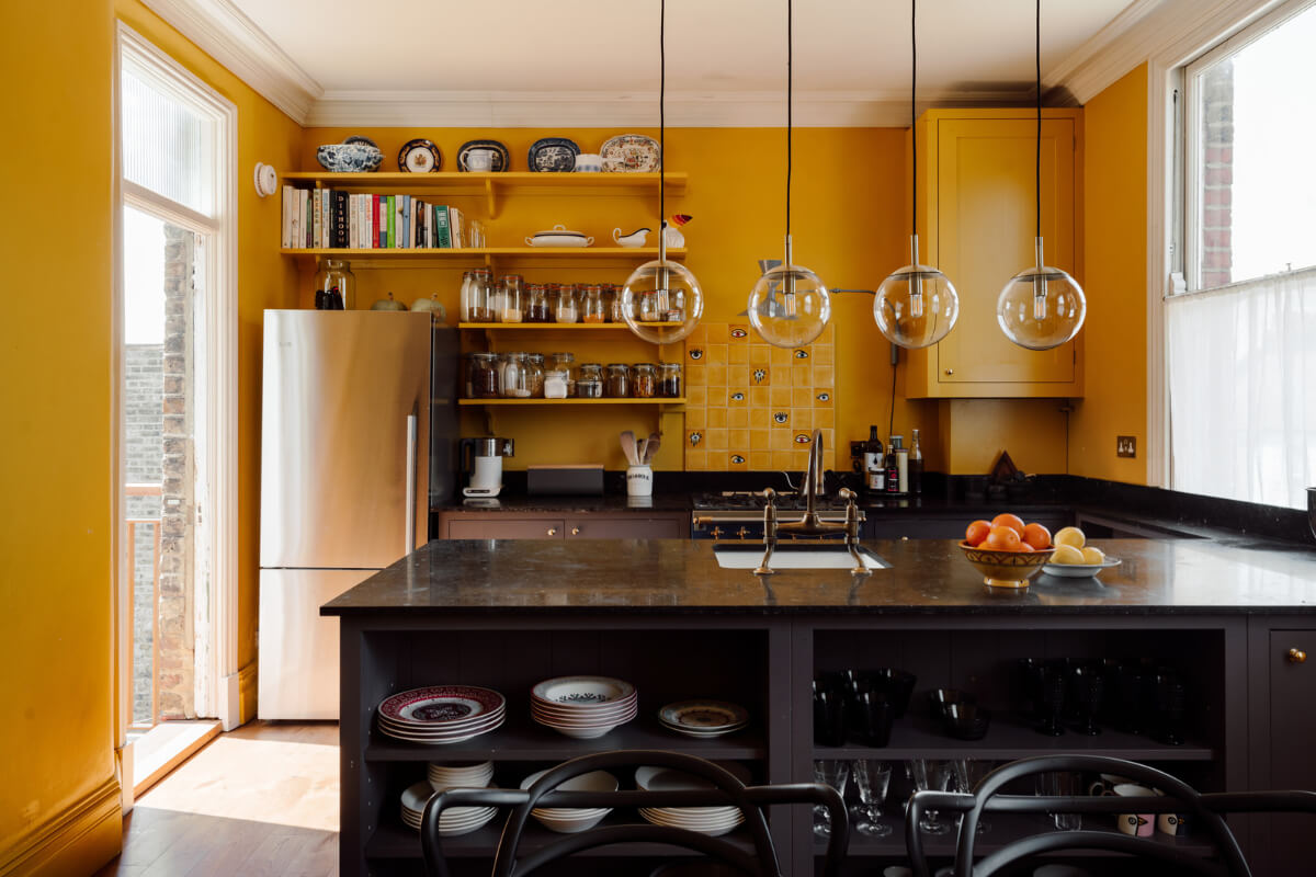Pastel Tones and Deep Yellow in an Early 20th-Century London Apartment 9 kitchen yellow walls