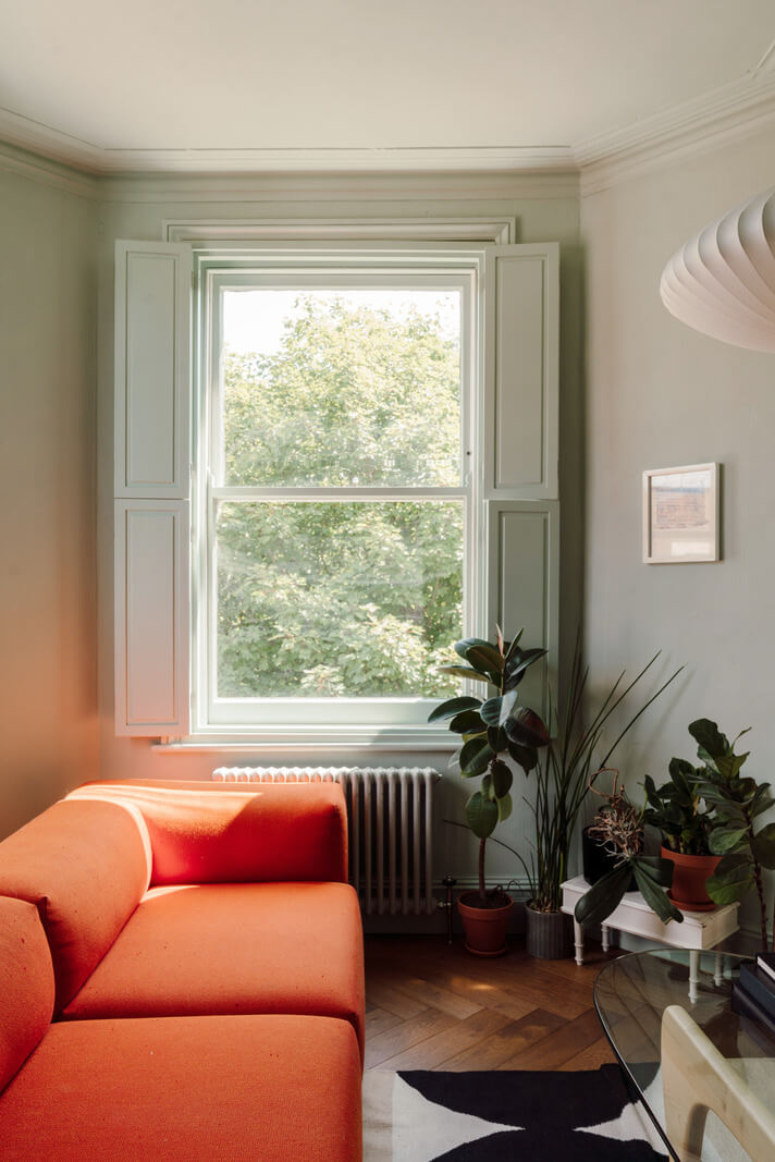Pastel Tones and Deep Yellow in an Early 20th-Century London Apartment 3 large living room window