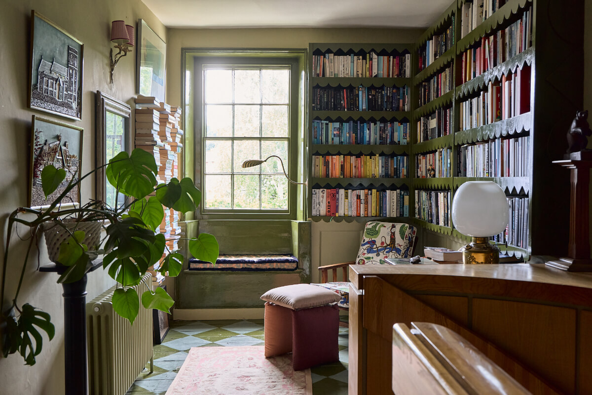 A Colored Sixth Wall May Be The Biggest Paint Trend in 2026 2 library room painted floorboards