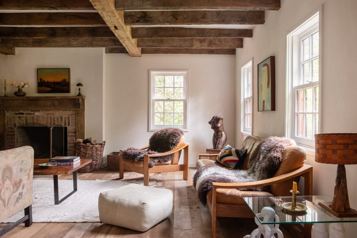 A Reimagined Farmhouse by Corbin Bernsen and Amanda Pays Lists for $4.6 Million 3 living room brick fireplace exposed ceiling beams