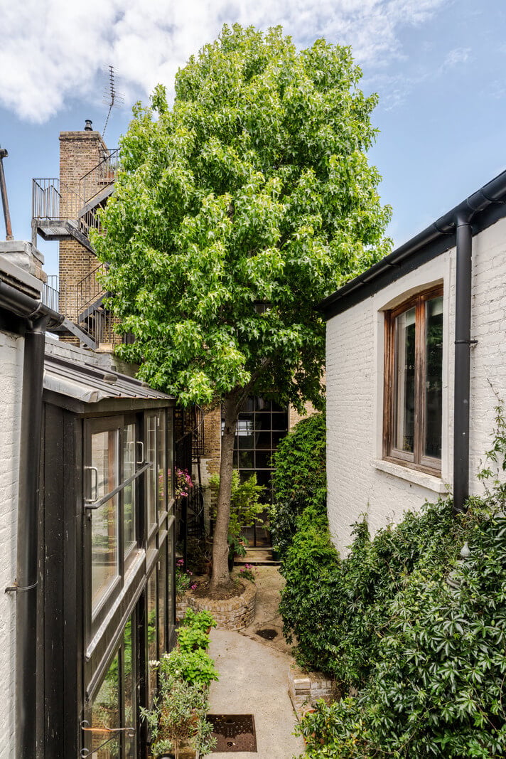 An Industrial Mews House with a Sebastian Cox deVOL Kitchen 25 mews house courtyard from above