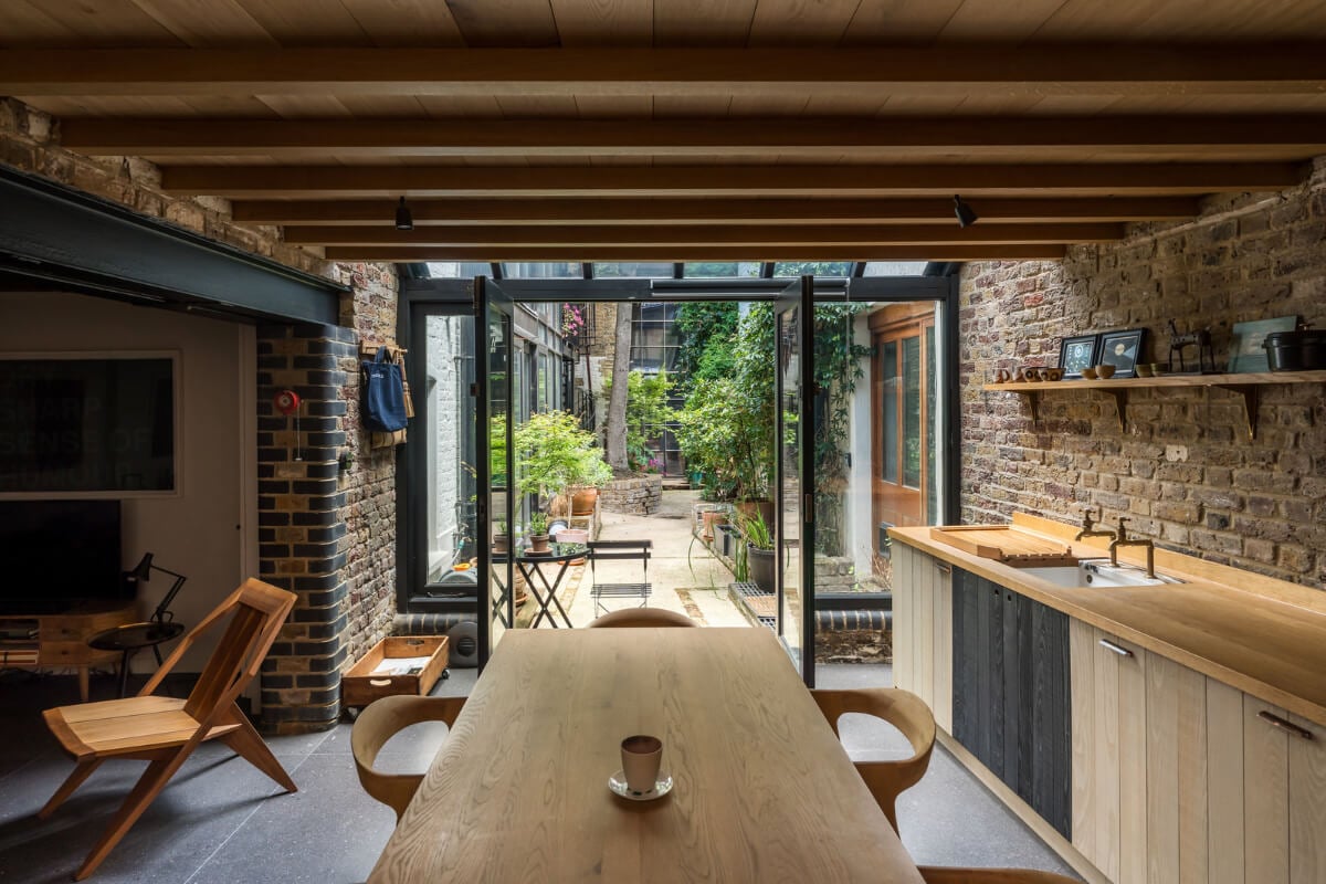 An Industrial Mews House with a Sebastian Cox deVOL Kitchen 7 mews house open-plan living space courtyard terrace