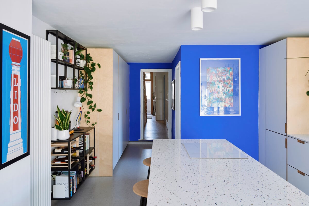 Colorful Rooms and a Modern Kitchen in a Spacious Family Home 6 modern kitchen blue accent wall