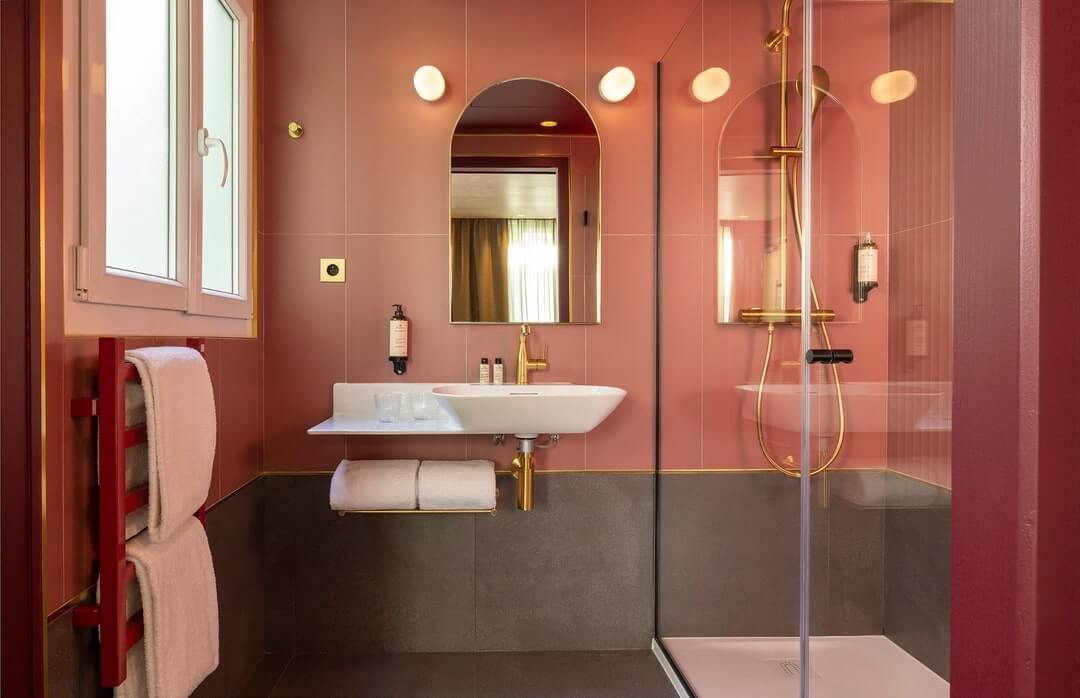 Where To Stay in the Latin Quarter of Paris 15 pink bathroom brass fittings hotel jardin de cluny Where To Stay in the Latin Quarter of Paris