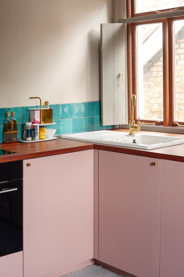 Pastel Tones and Midcentury Design in a Top Floor London Apartment 3 pink kitchen detail
