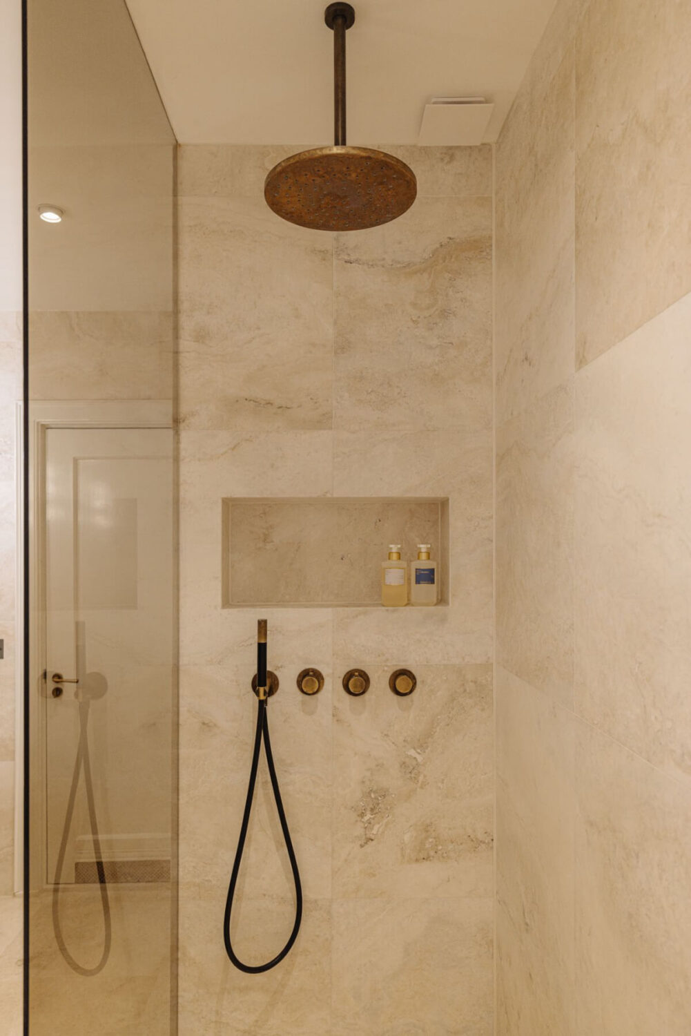 A Luxurious Parisian-Inspired Apartment in Amsterdam 24 shower with storage niche