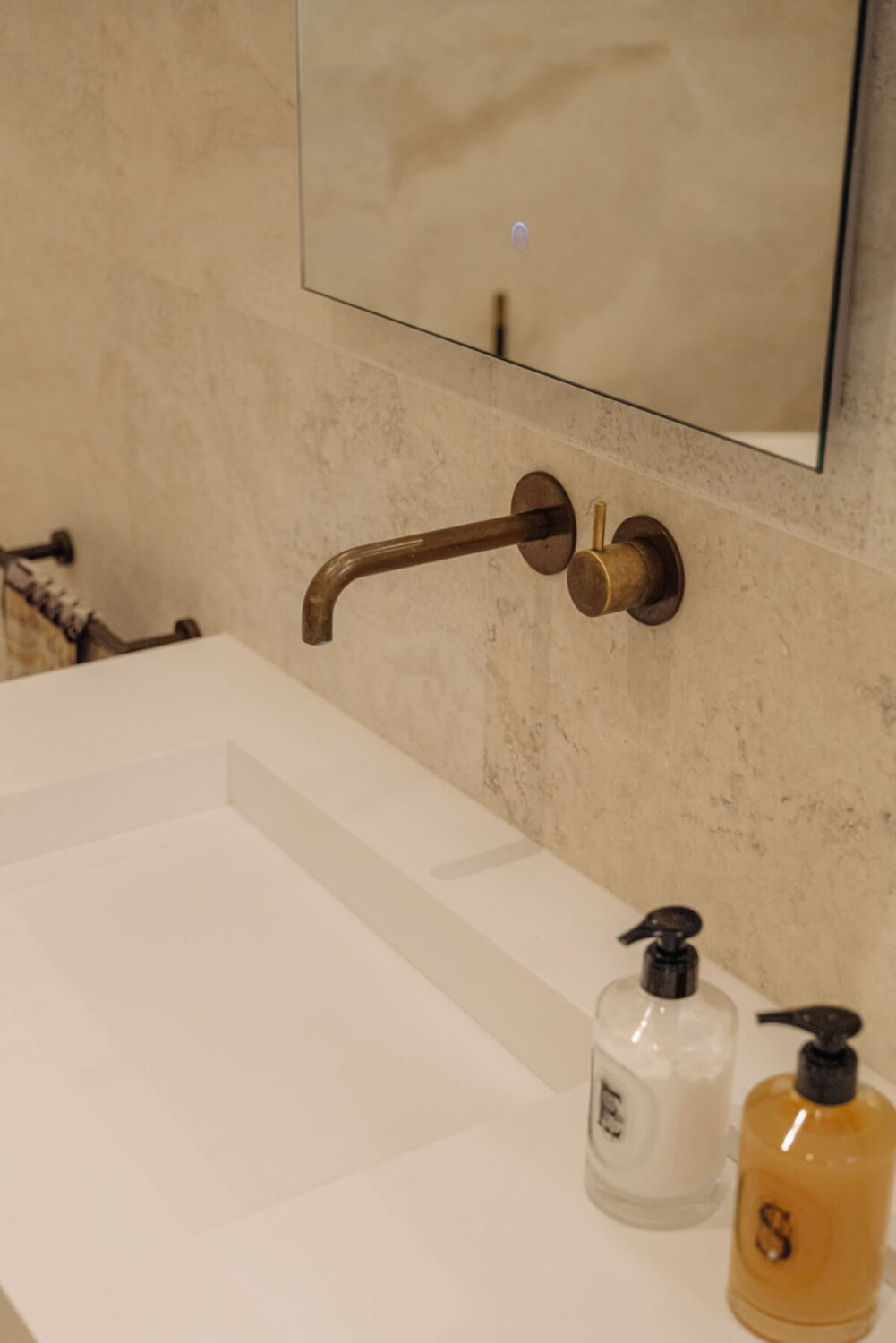 A Luxurious Parisian-Inspired Apartment in Amsterdam 22 sink brass fittings