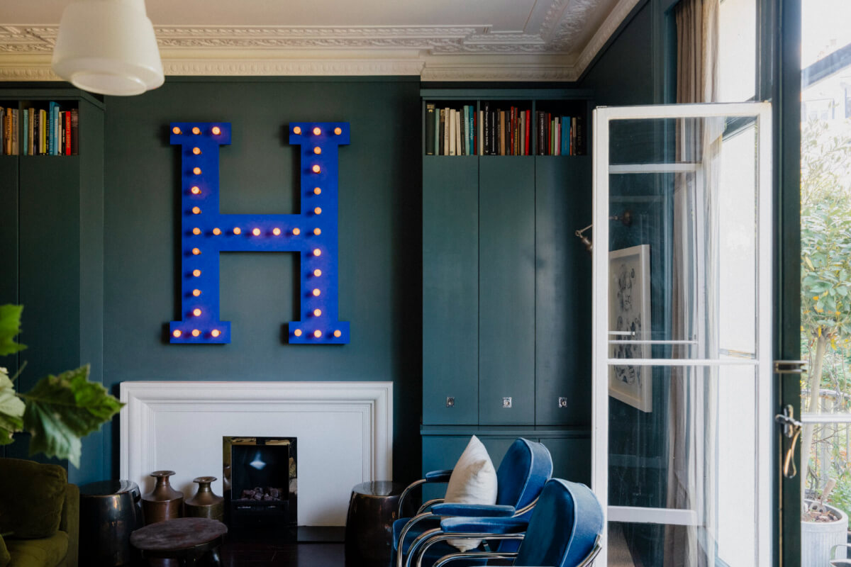 A Rich Color and Material Palette in a Small Victorian Apartment 10 sitting-room-built-in-cabinets