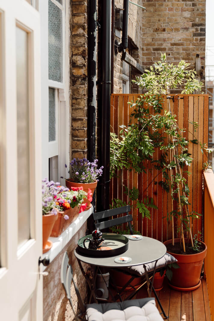 Pastel Tones and Deep Yellow in an Early 20th-Century London Apartment 17 small balcony