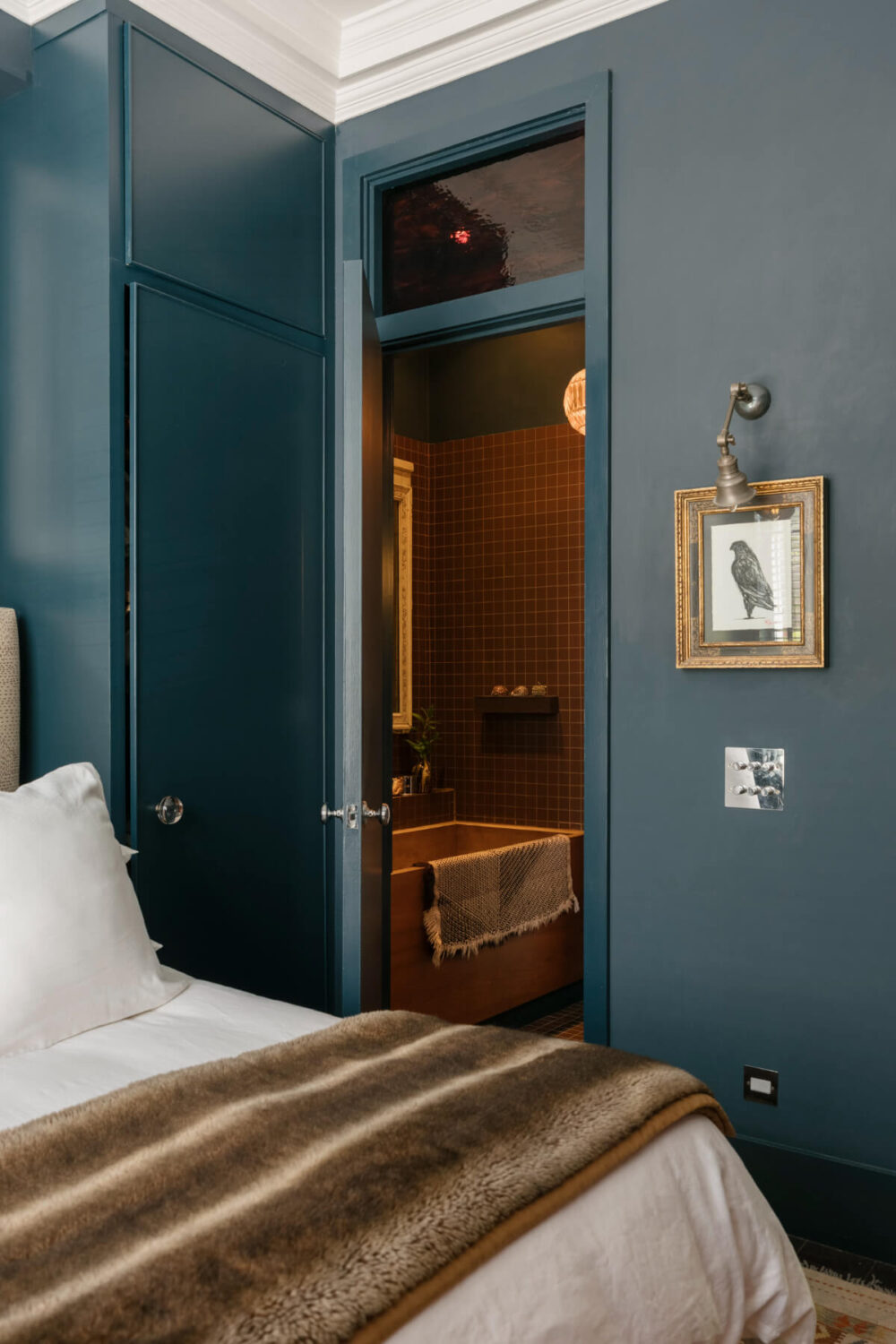 A Rich Color and Material Palette in a Small Victorian Apartment 18 small dark blue bedroom with wardrobes and en-suite bathroom
