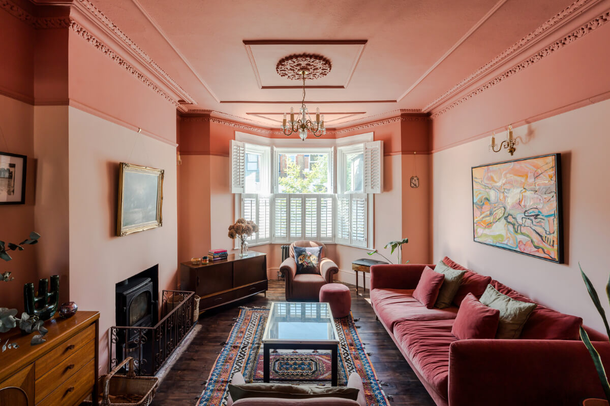 A Two-Tone Pink Living Room in a Victorian London House 1 two-tone pink living room with bay window