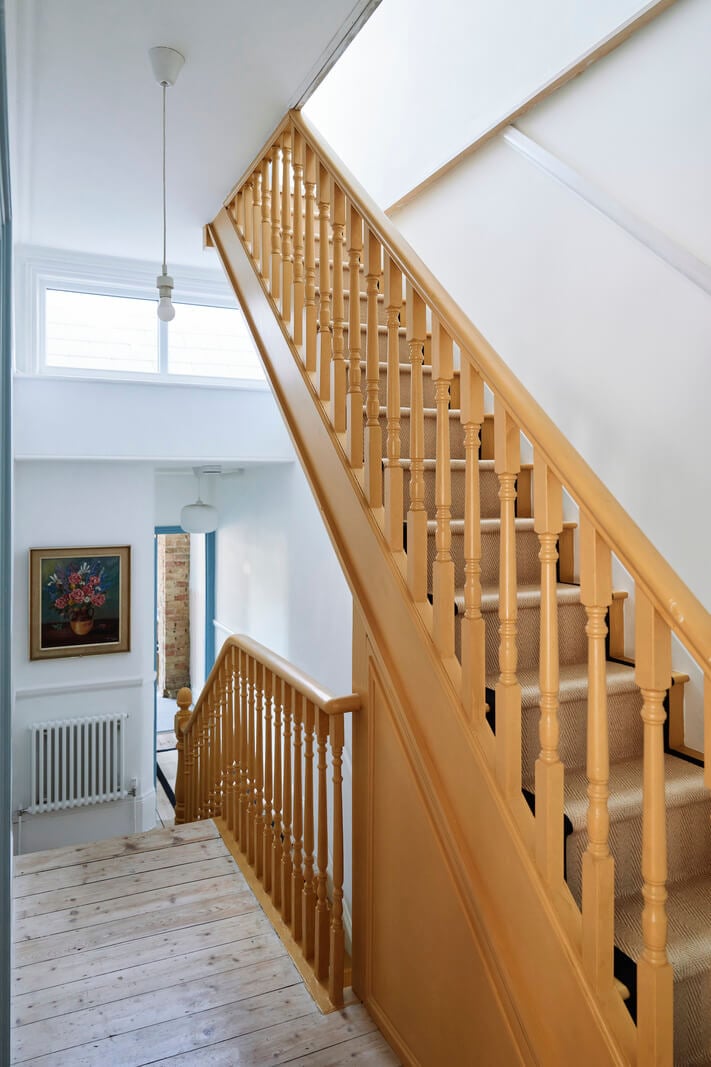 Colorful Rooms and a Modern Kitchen in a Spacious Family Home 24 yellow staircase