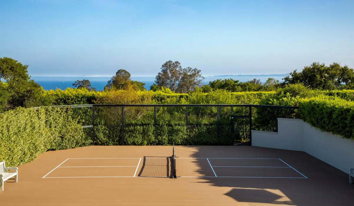 The Top Home Design Trends for 2026: Bold Color, Cozy Corners & Climate-Ready Living 24 Adam-Levine-Behati-Prinsloo-Montecito-Estate-For-Sale-Nordroom-tennis-court