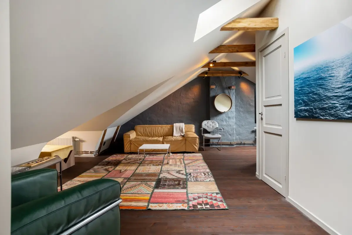 A Harmonious Color Palette in a Luxurious Stockholm Duplex Apartment 23 attic space living room
