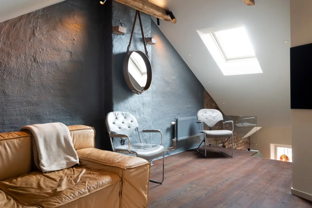 A Harmonious Color Palette in a Luxurious Stockholm Duplex Apartment 22 attic space wooden beams