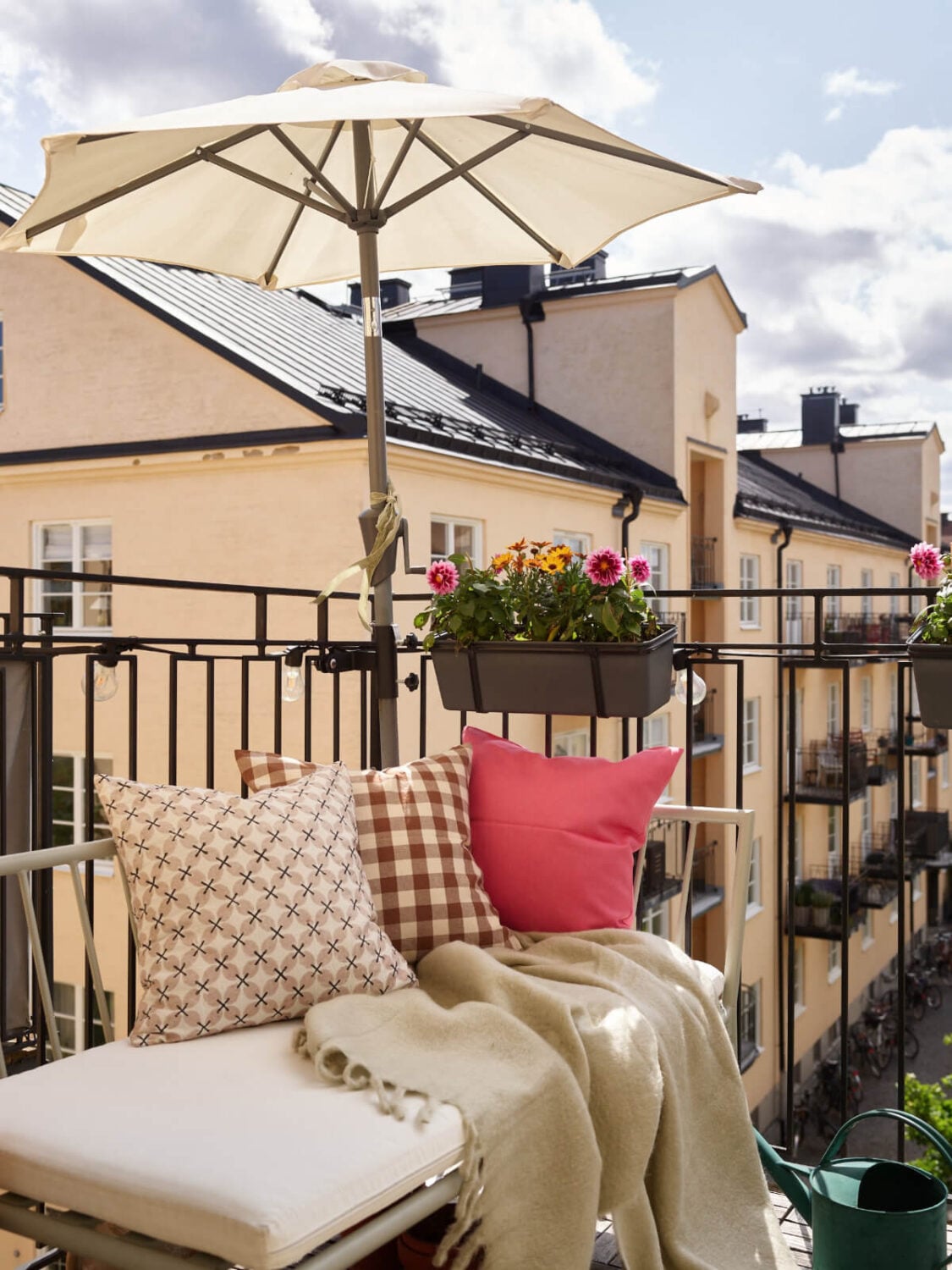 A Stockholm Apartment with a Butter-Yellow Bedroom 20 balcony