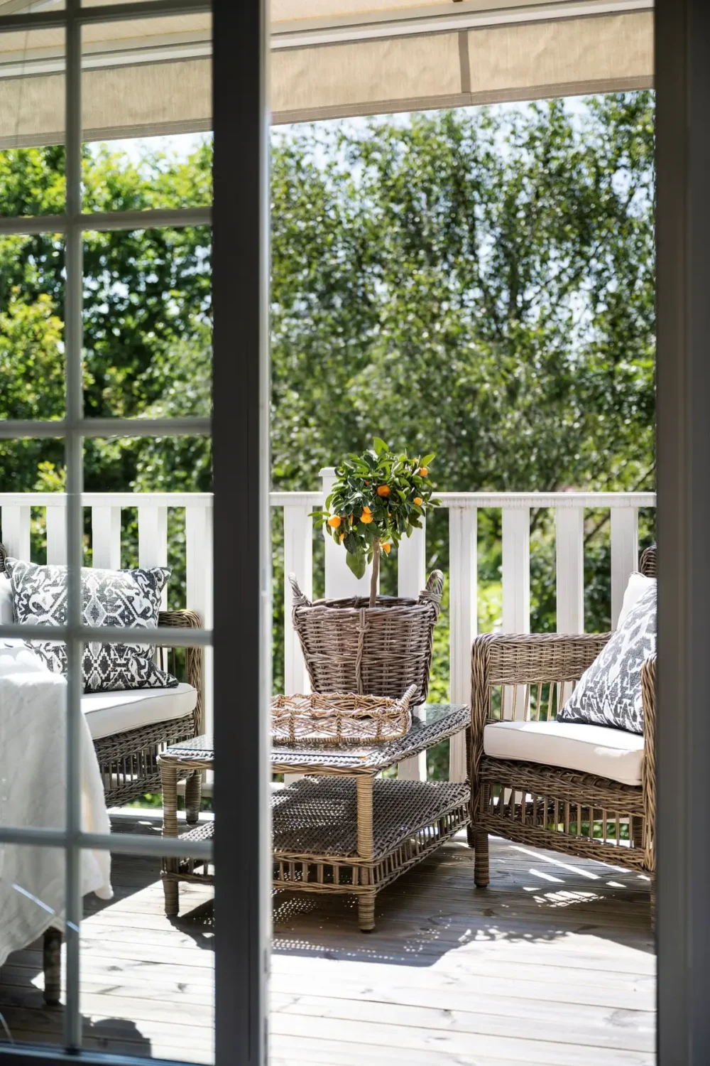 Scandinavian Design Meets The Hamptons in a Swedish Country House 39 balcony wicker furniture