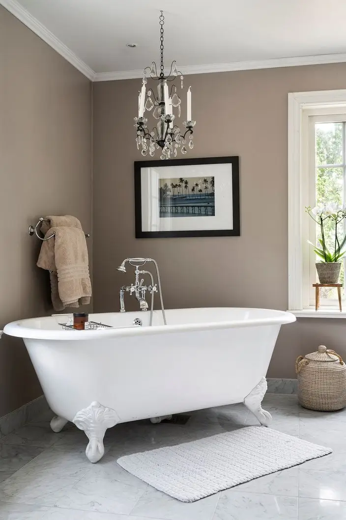 Scandinavian Design Meets The Hamptons in a Swedish Country House 45 bathroom classic freestanding bath marble tiles nordroom