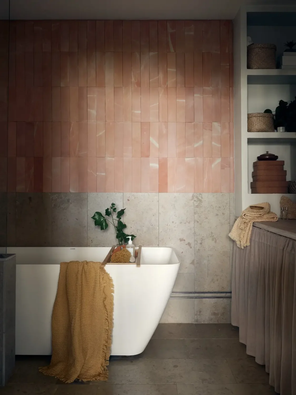 Industrial Elements in a 1960s Duplex Apartment in Stockholm 39 bathroom pink tiles freestanding bath