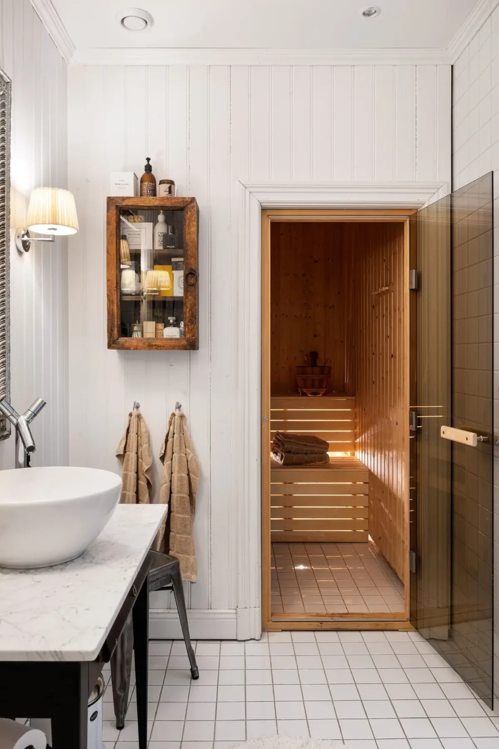 Scandinavian Design Meets The Hamptons in a Swedish Country House 32 bathroom with sauna