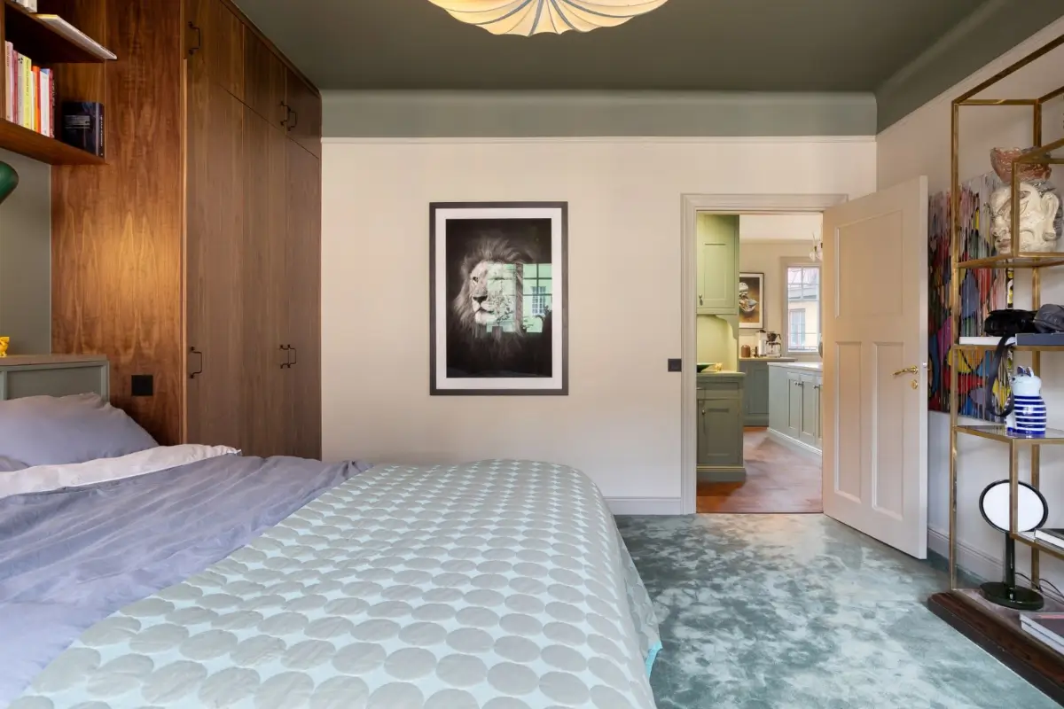 A Harmonious Color Palette in a Luxurious Stockholm Duplex Apartment 16 bedroom built-in wardrobes light blue carpet