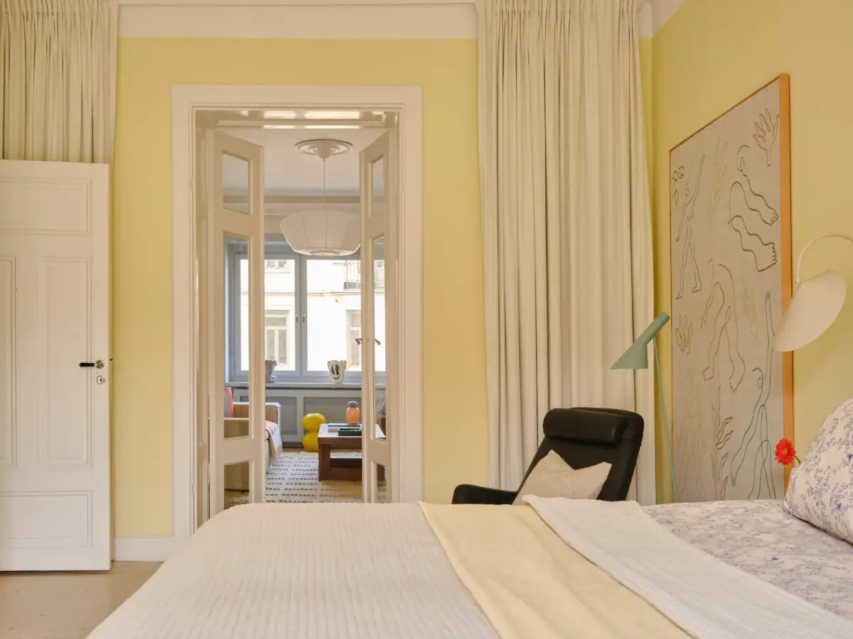 Pastel Hues in a Light-Filled 1880s Apartment in Stockholm 9 bedroom butter yellow walls